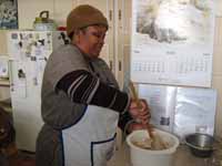 Lady preparing bread dough