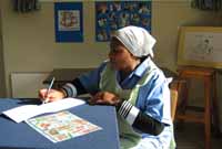 Lady on course at table