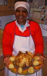 Sarah Mkwanazi with Roast Chicken, Roast Potatoes and Pumpkin